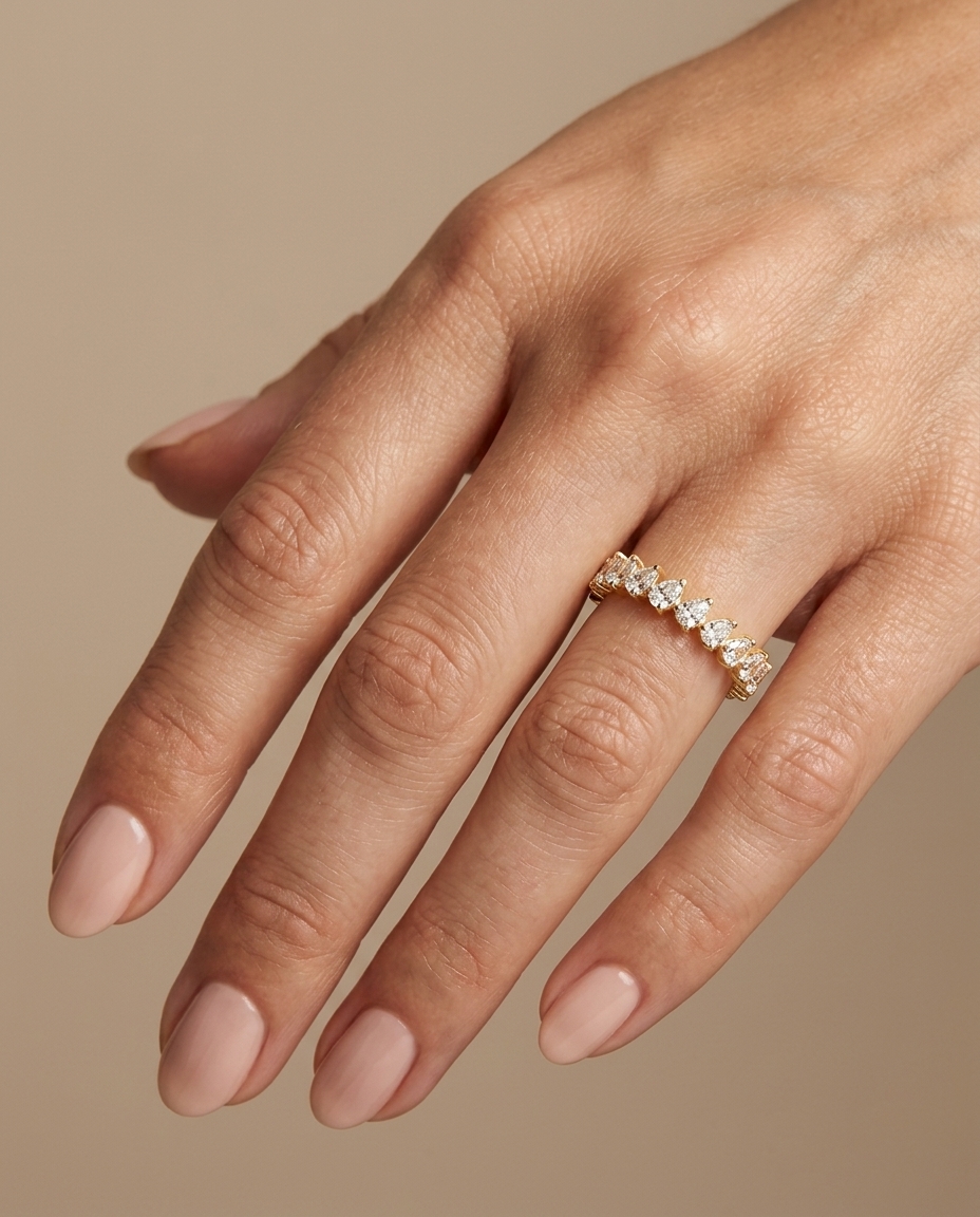 14KT Gold Ring with Pear Shape Diamonds on model