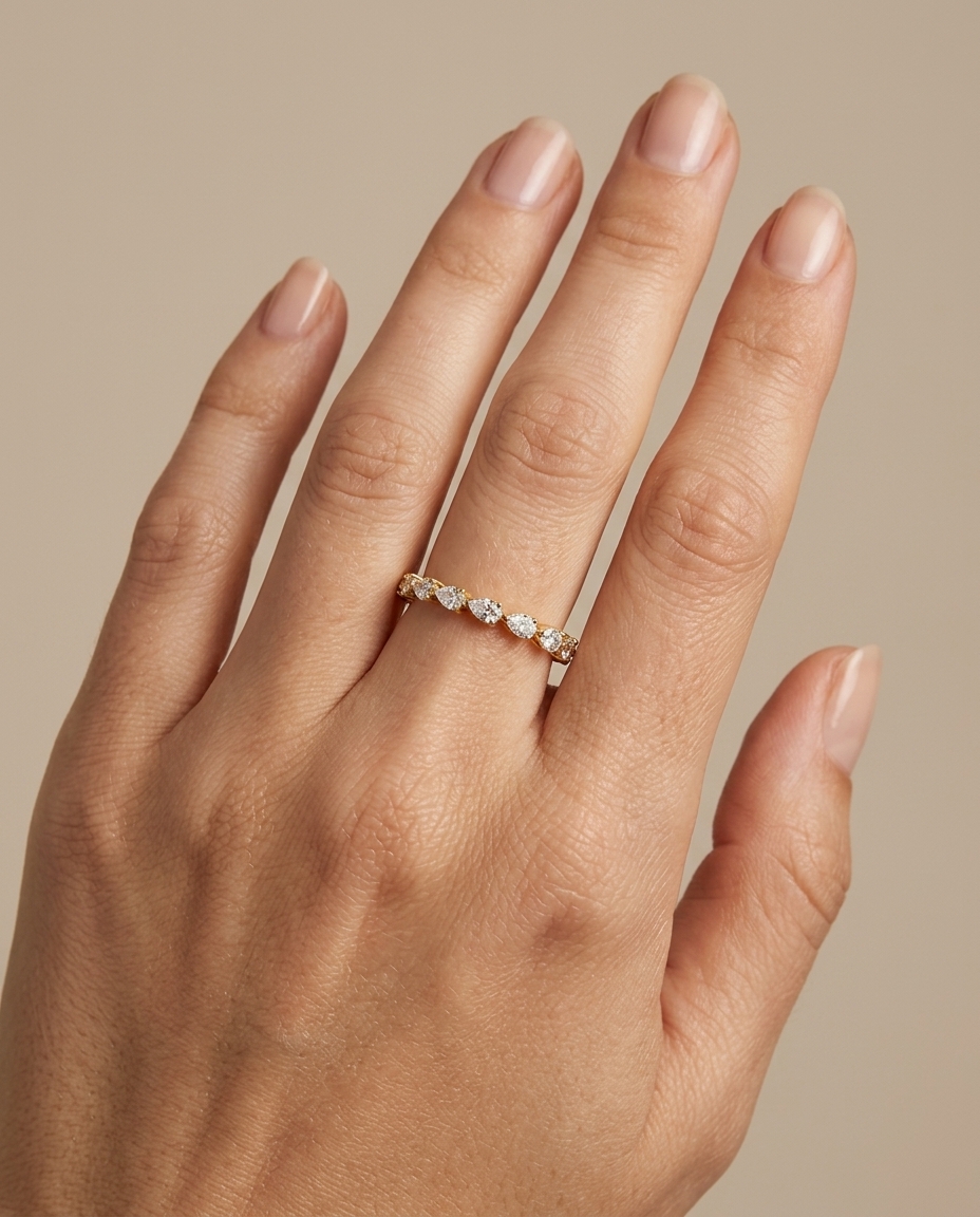 14KT Gold Ring with Pear Shape Diamonds on model