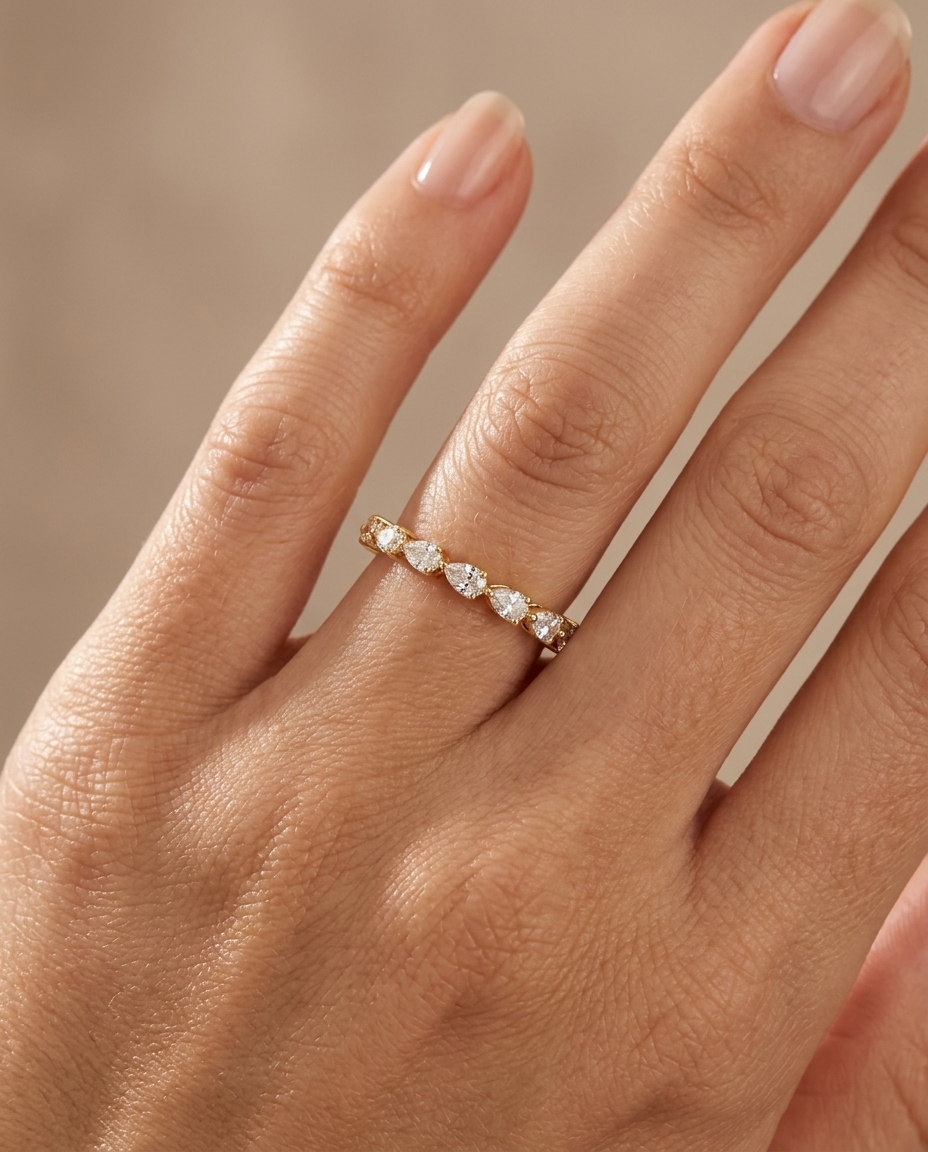14KT Gold Ring with Pear Shape Diamonds on model