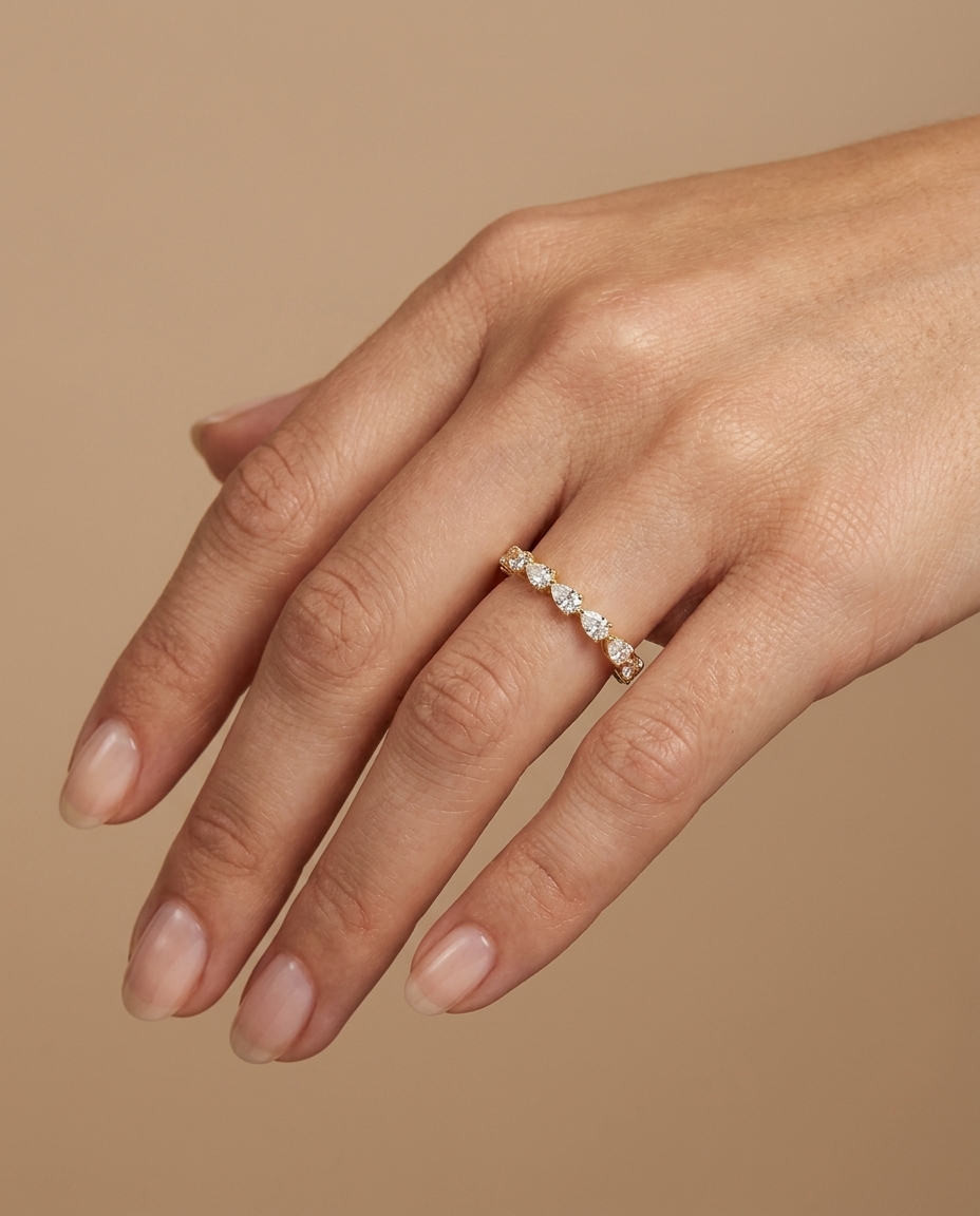 14KT Gold Ring with Pear Shape Diamonds on model