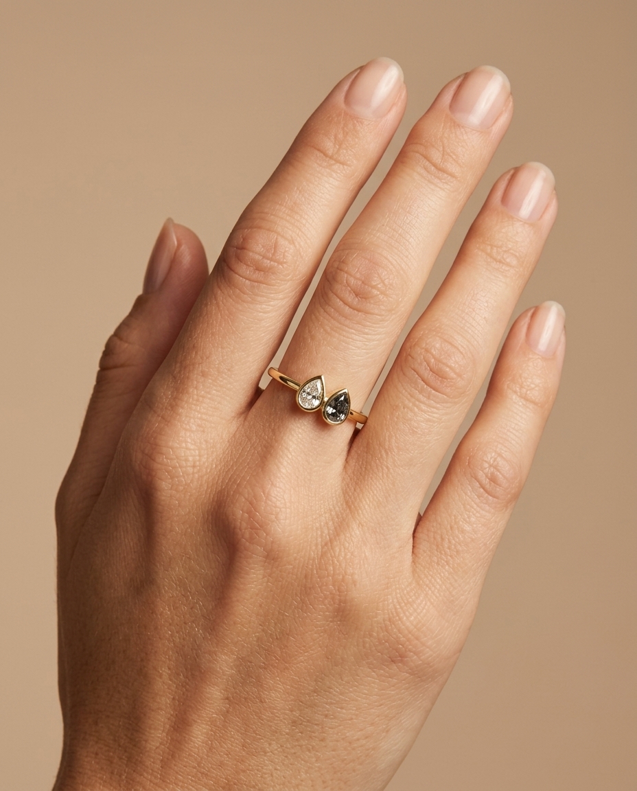 14KT Gold Ring with Single Bezeled Pear Shape Diamond view 2