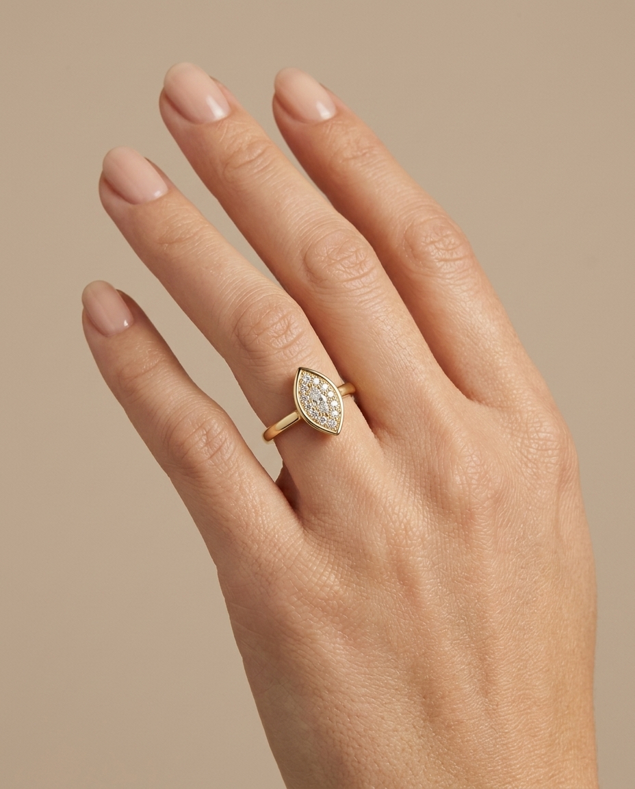 14KT Gold Ring with Single Bezeled Marquise Shape Diamond on model