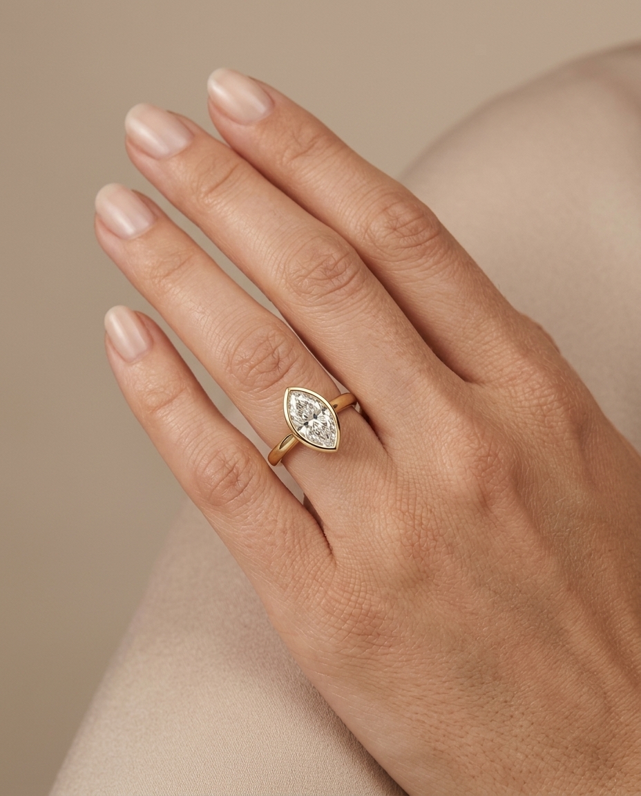 14KT Gold Ring with Single Bezeled Marquise Shape Diamond view 2