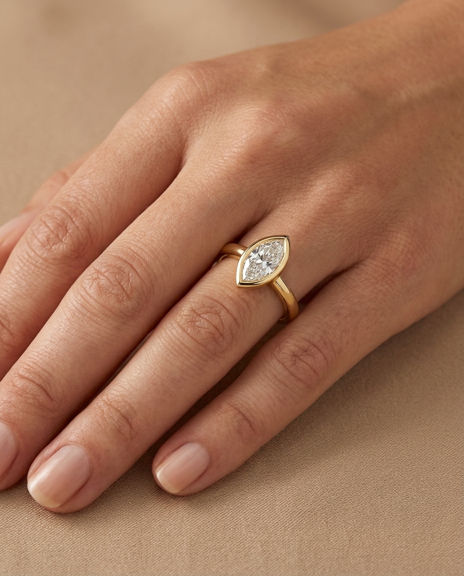 14KT Gold Ring with Single Bezeled Marquise Shape Diamond view 2