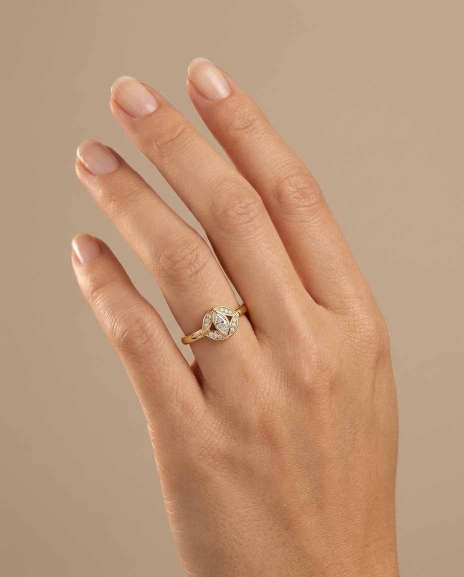 14KT Gold Ring with Single Bezeled Marquise Shape Diamond on model