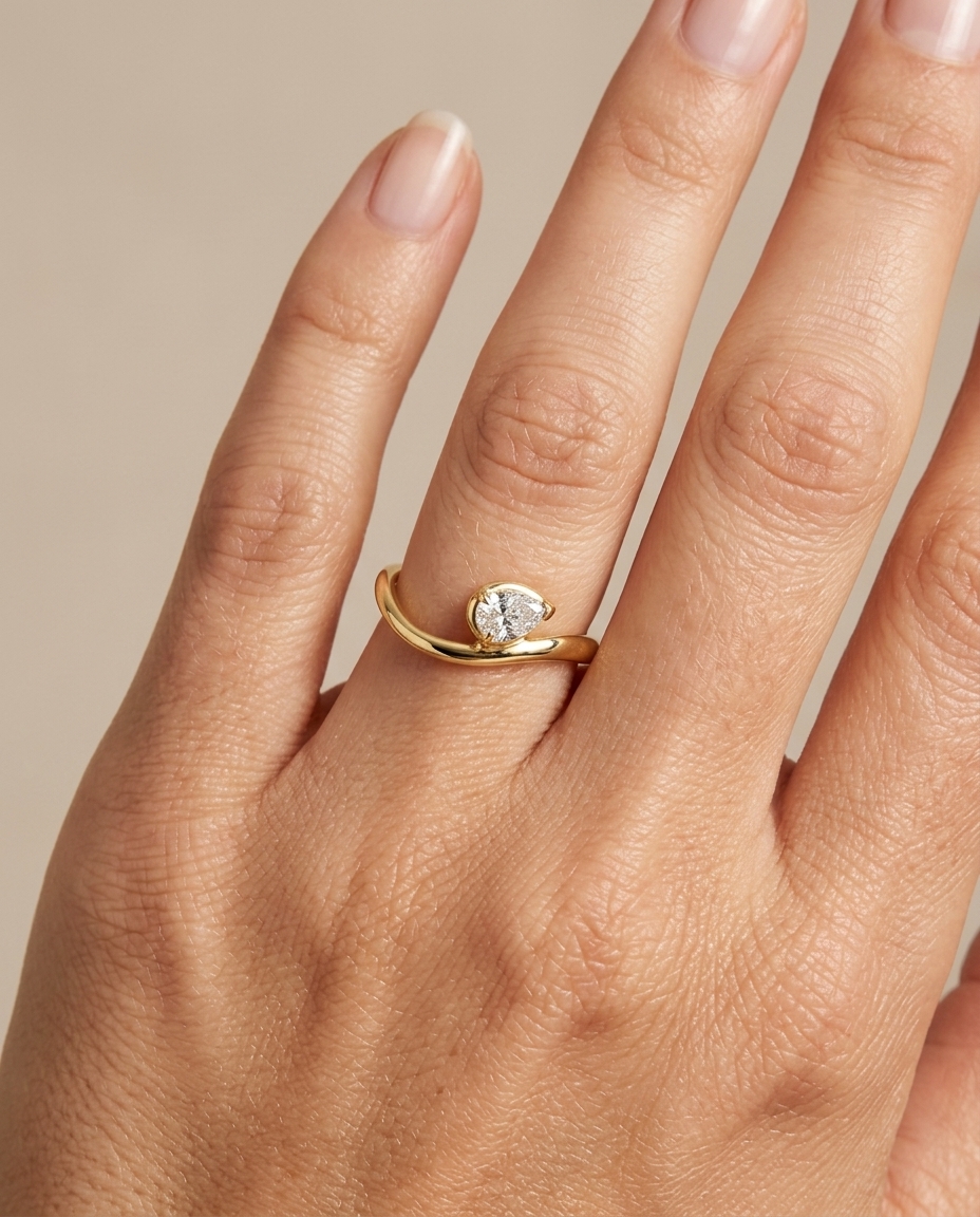 14KT Gold Pear Shape Diamond Ring on model