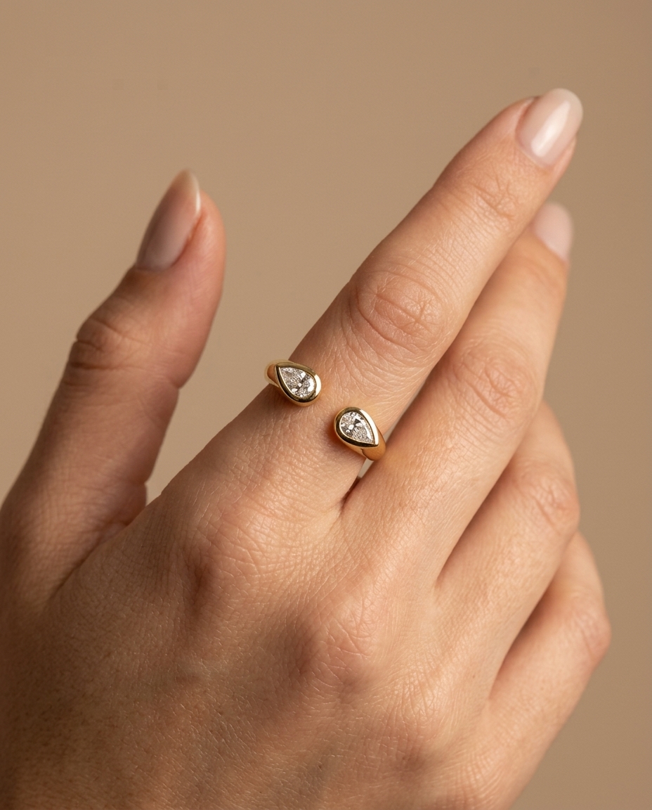 14KT Gold Pear Shape Diamond Open Ended Ring on model