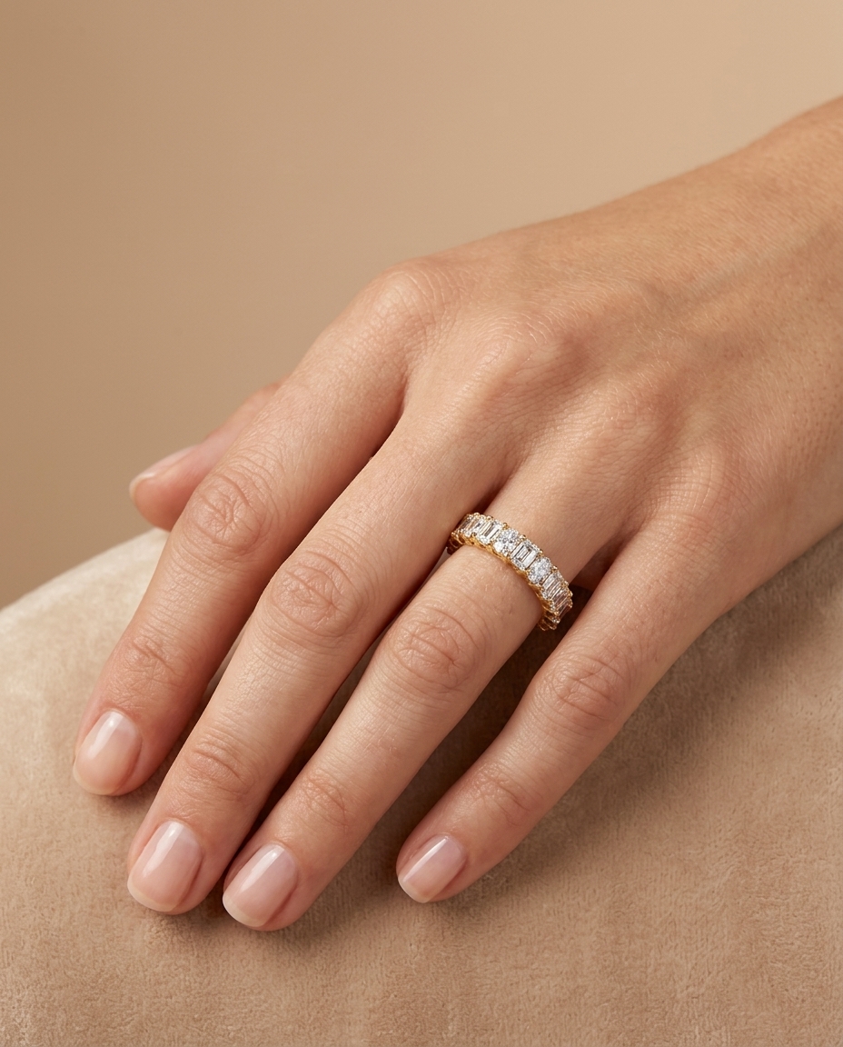 14KT Gold Round and Emerald Cut Diamond Ring on model