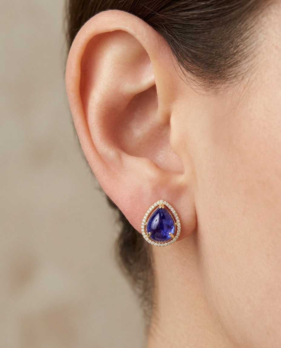 14KT Yellow Gold Pear Shape Tanzanite and Diamond Ring on model