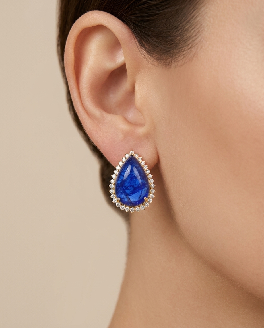 14KT Yellow Gold Pear Shape Tanzanite and Diamond Ring on model