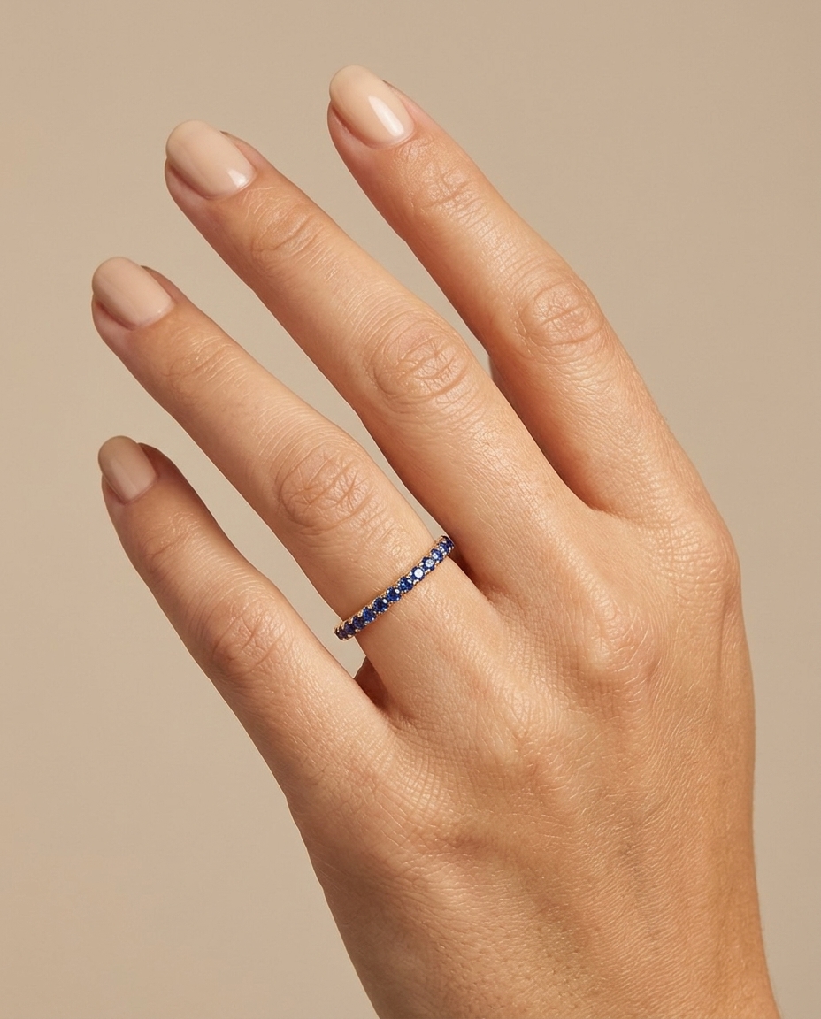 14KT Gold Full Eternity Blue Sapphire Thin Ring Band on model