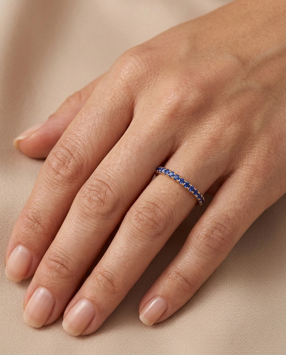 14KT Gold Full Eternity Blue Sapphire Thin Ring Band on model