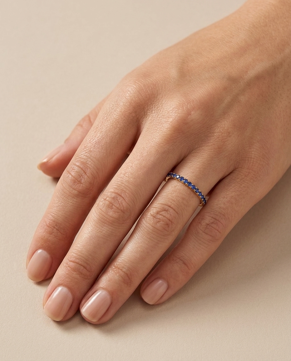 14KT Gold Full Eternity Blue Sapphire Thin Ring Band on model