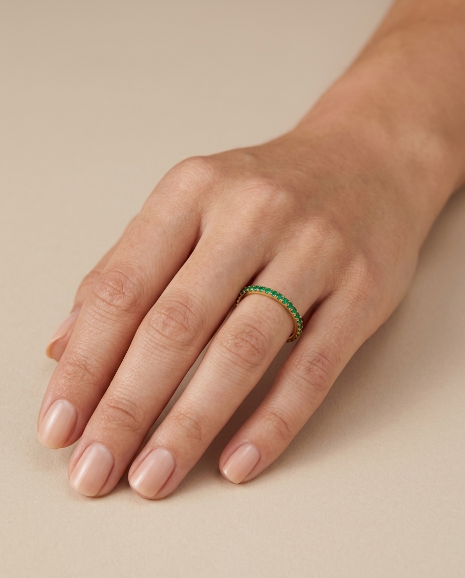14KT Gold Full Eternity Emerald Thin Ring Band on model