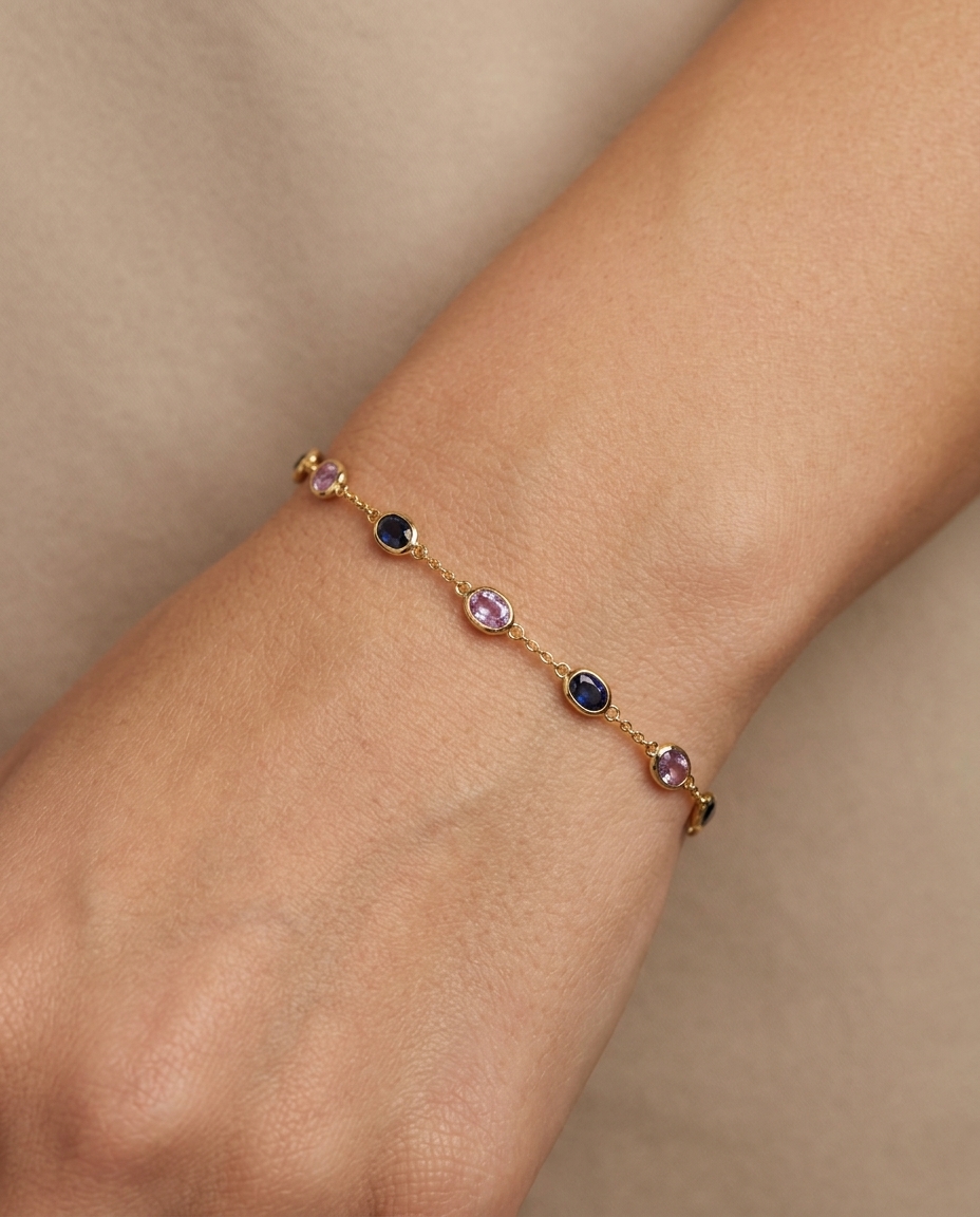 18KT Gold Blue and Pink Sapphire Station Bracelet on model