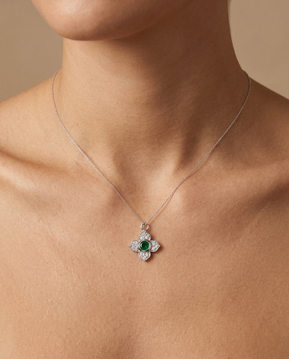 14KT Yellow Gold Emerald and Diamond Flower Pendant on model