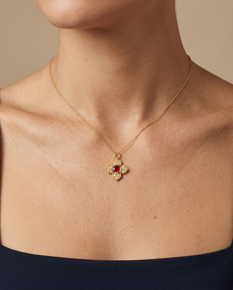 14KT Gold Ruby and Diamond Flower Pendant on model