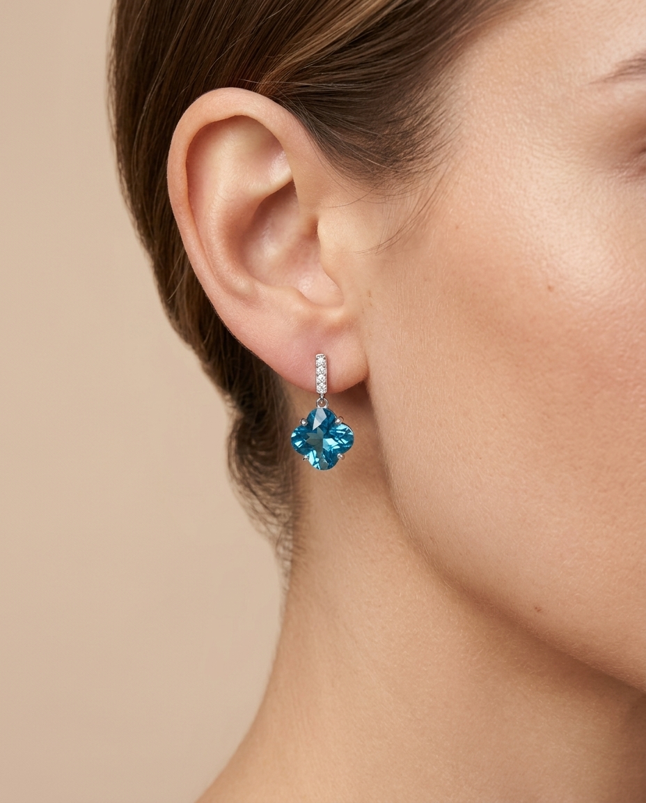 14KT White Gold Blue Topaz and Diamond Earring on model