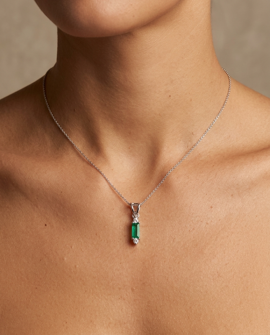 18KT White Gold Diamond and Emerald Pendent on model