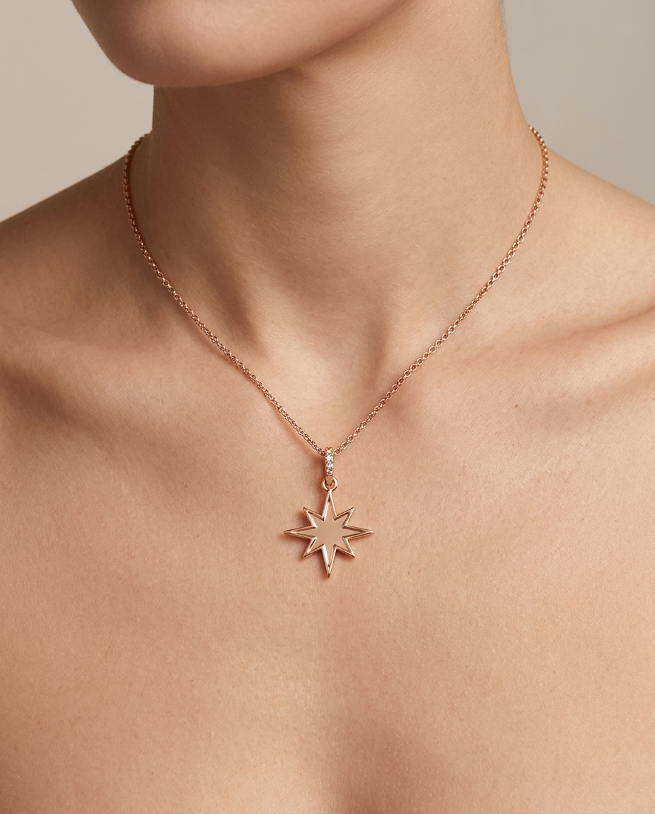 18KT Yellow Gold Starbust Pendant on model