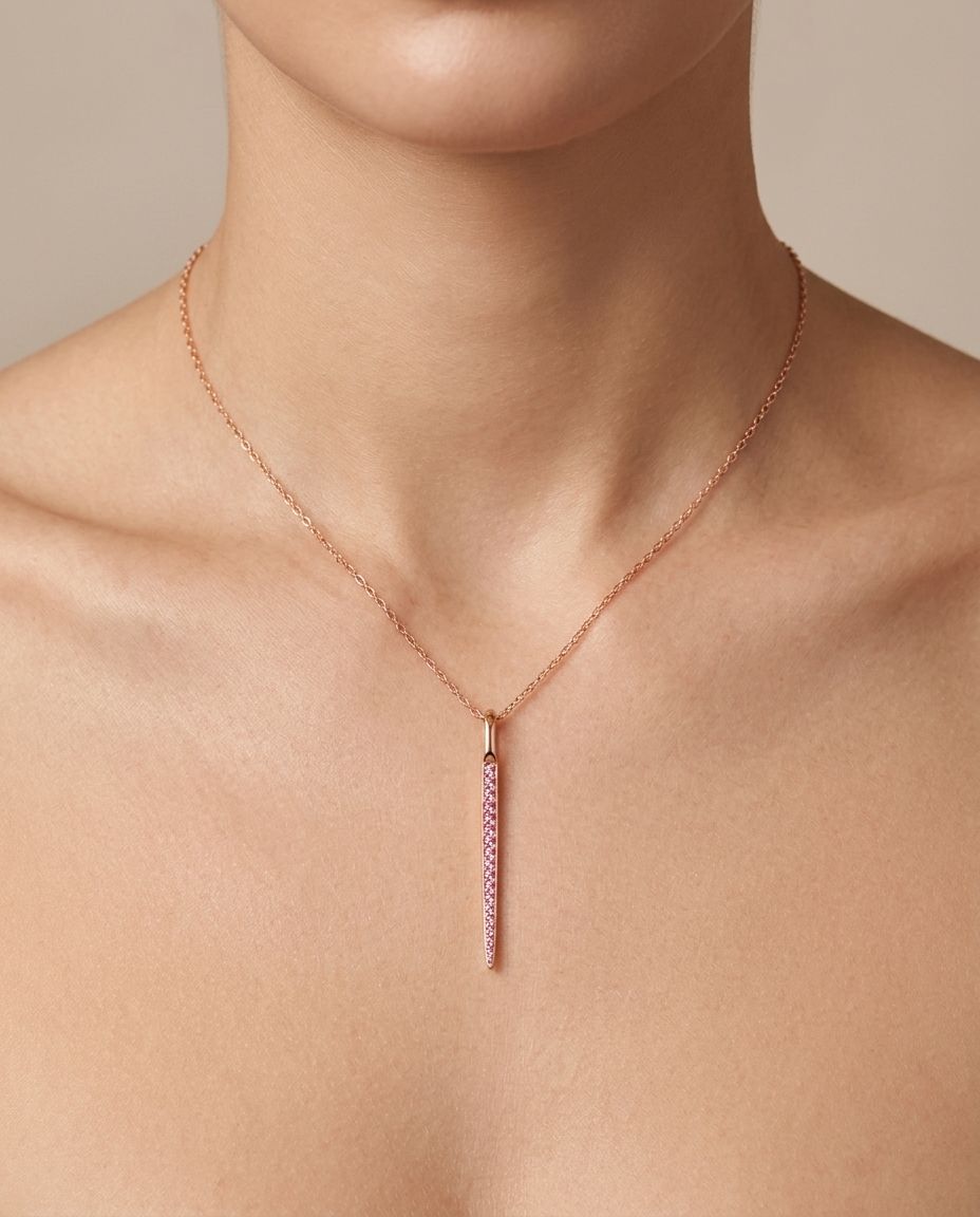 14KT Rose Gold Spike Pendant with Pink Sapphire on model
