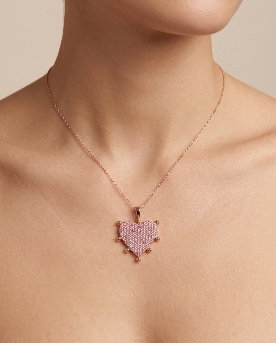 14KT Rose Gold Pink Sapphire Heart Pendant on model