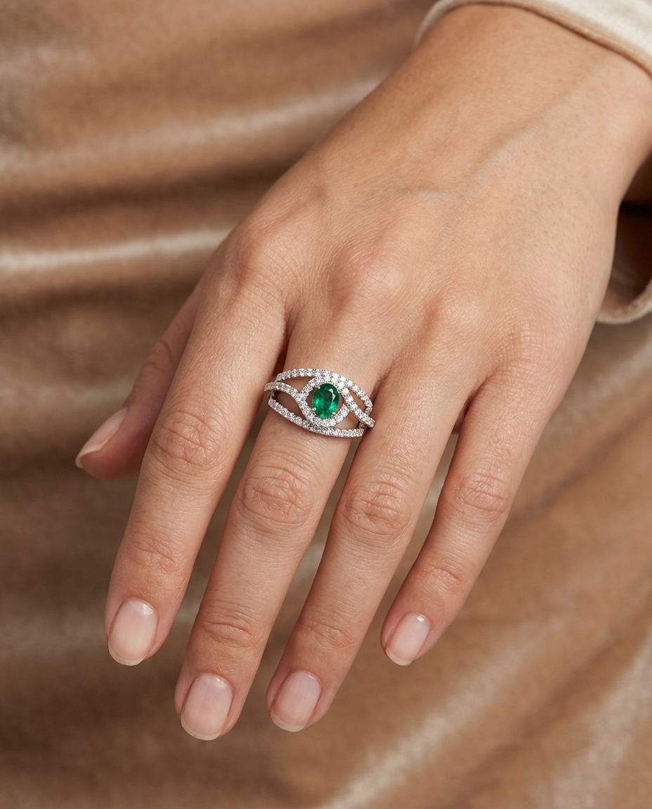 18KT White Gold Emerald and Diamonds Ring on model