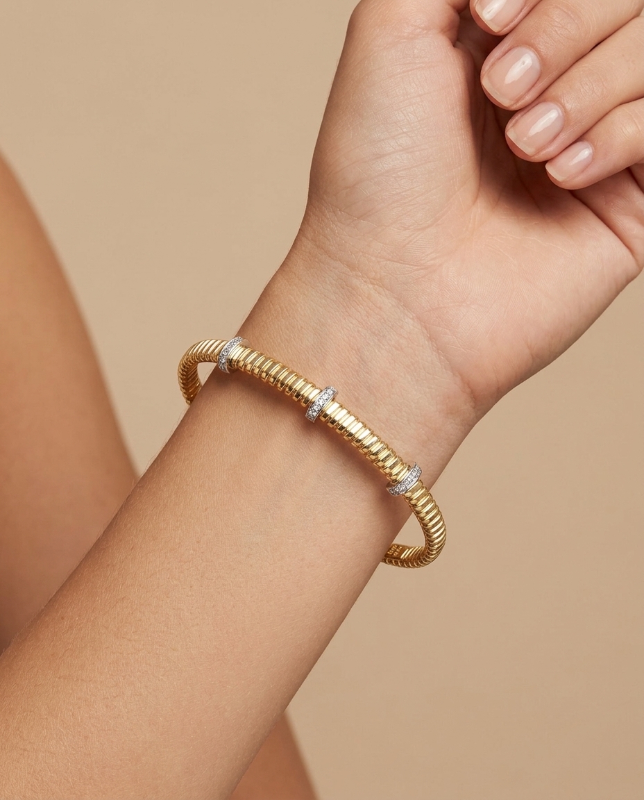 14KT Yellow Gold and Diamonds Tubogas Bangle on model
