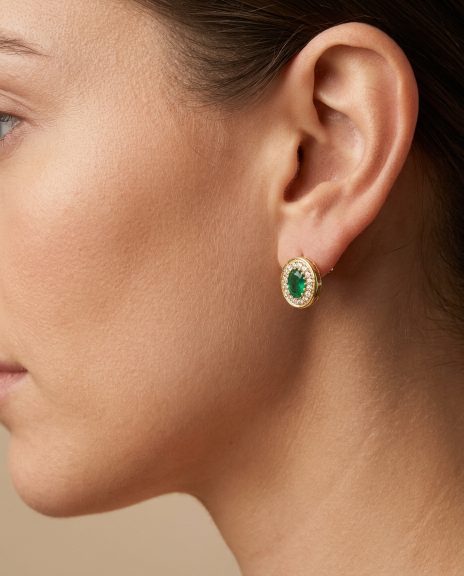 14KT Yellow Gold Diamond and Emerald Oval Earing Studs on model