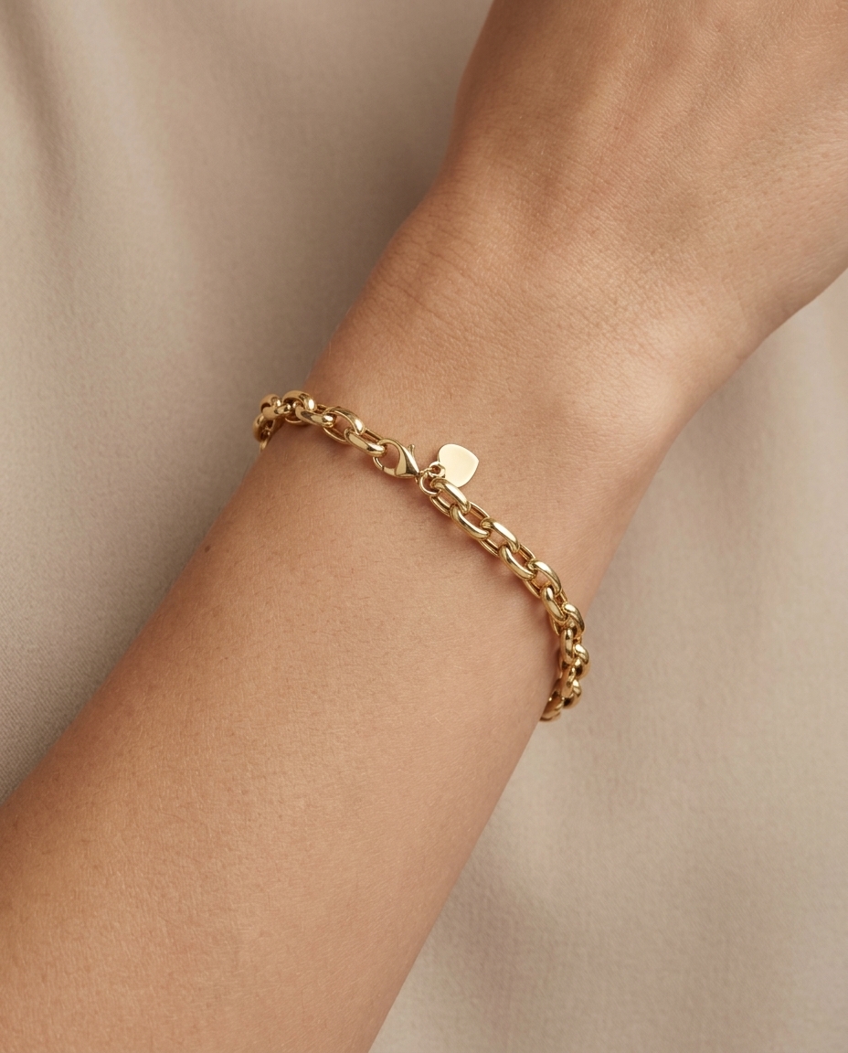 14KT Gold Oval Link Bracelet 7" on model