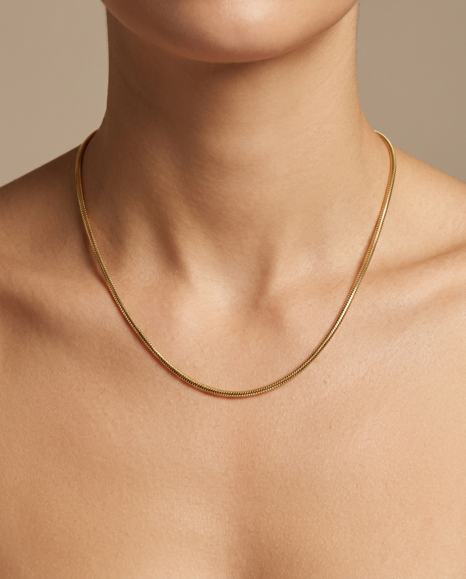 14KT Gold Round Snake Chain Necklace on model