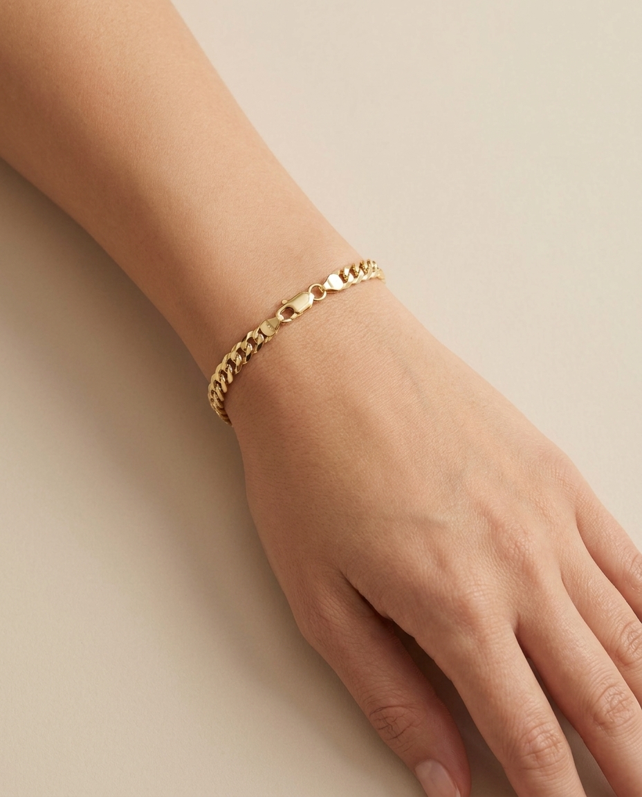 14KT Yellow Gold Flat Cuban Bracelet on model
