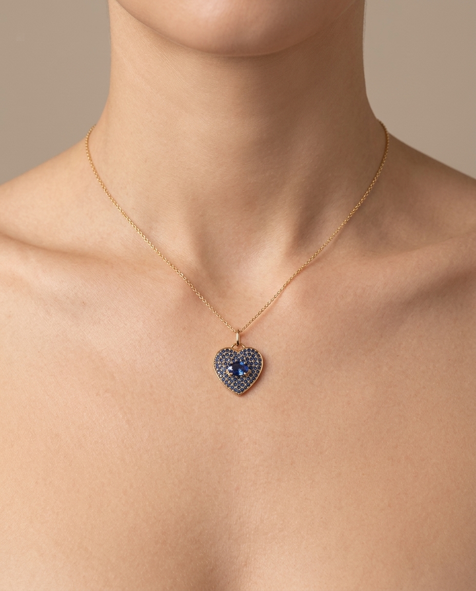 Blue Sapphire Heart Pendant in Yellow Gold on model
