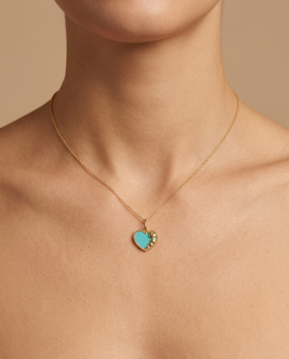 Turquoise Heart Pendant in Yellow Gold on model