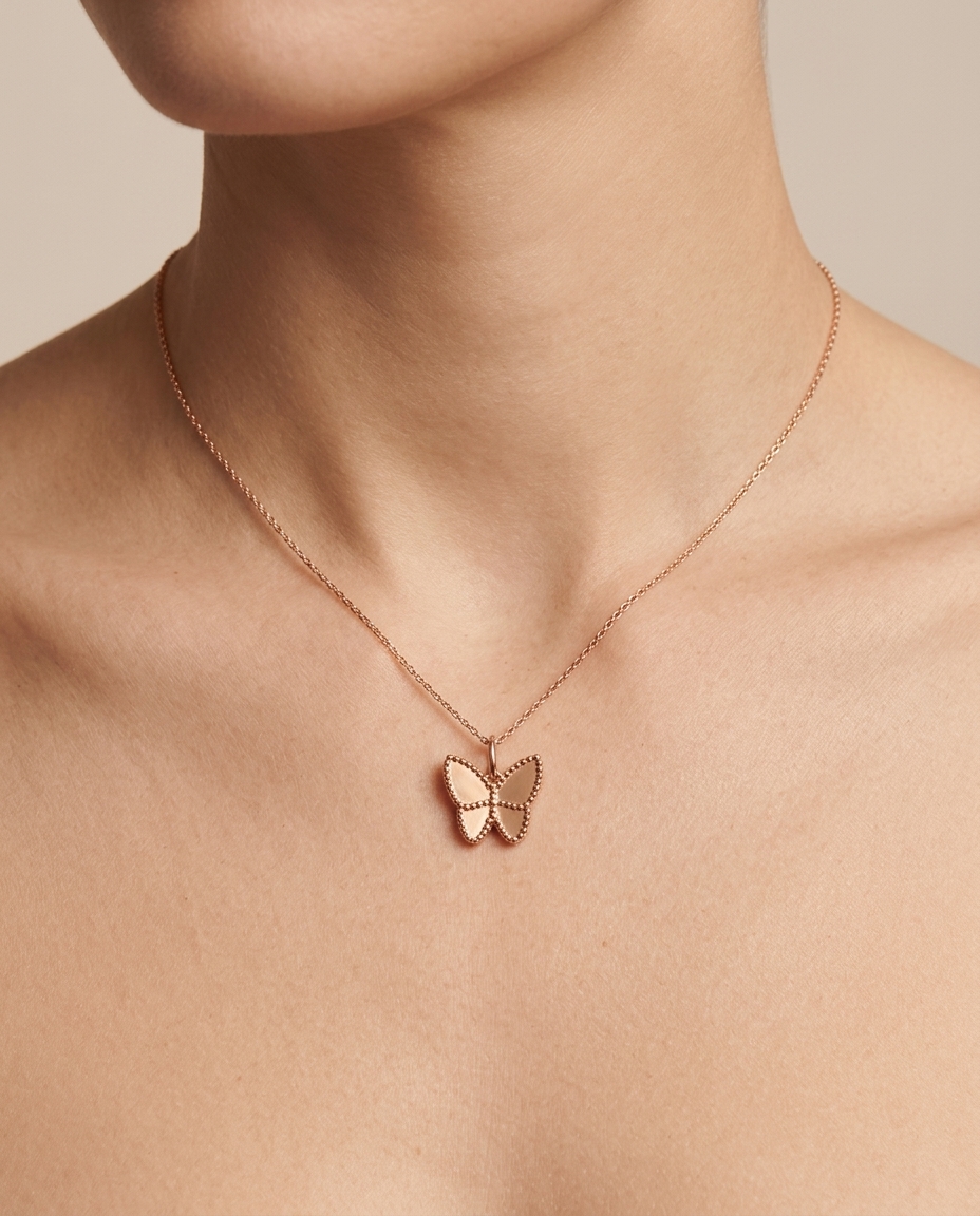 Butterfly Pendant in Yellow Gold on model