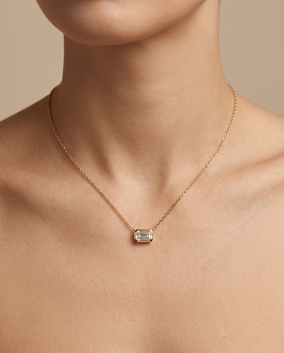 Emerald Shape Single Stone Diamond Necklace in Yellow Gold on model