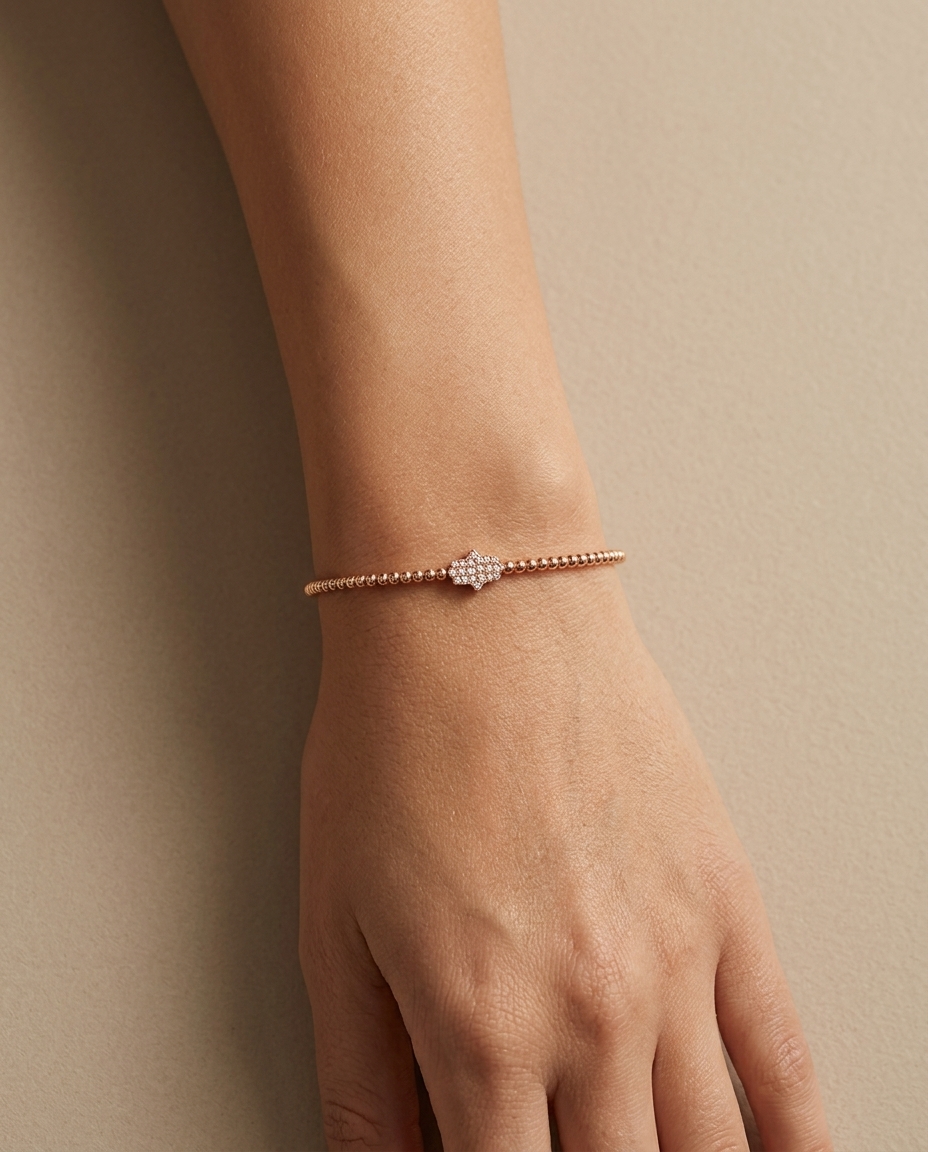 Beaded Shank Hamsa Diamond Bangle in Rose Gold on model