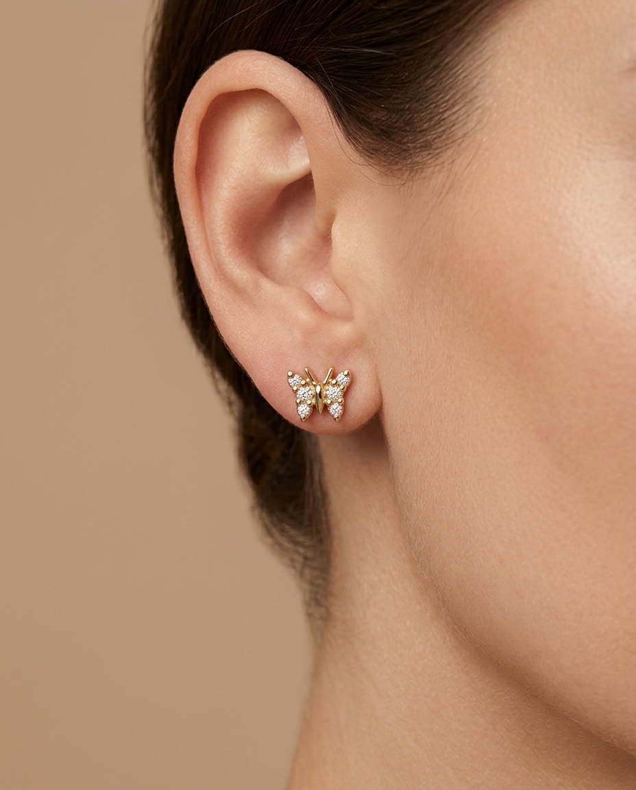 Butterfly Diamond Earrings in Yellow Gold on model