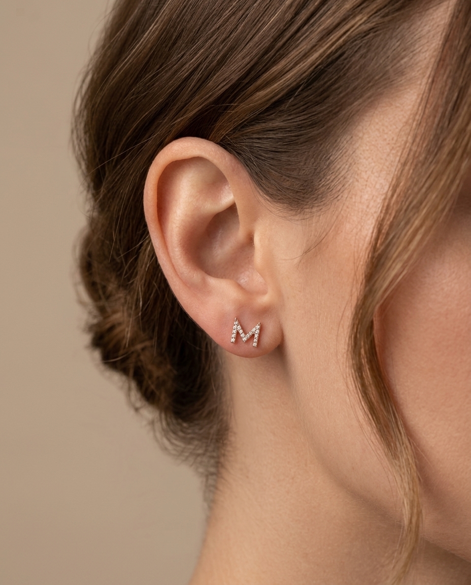 M Initial Diamond Earrings in Rose Gold on model