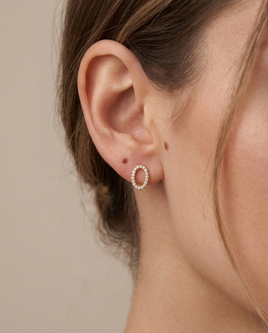 O Initial Diamond Earrings in Yellow Gold on model