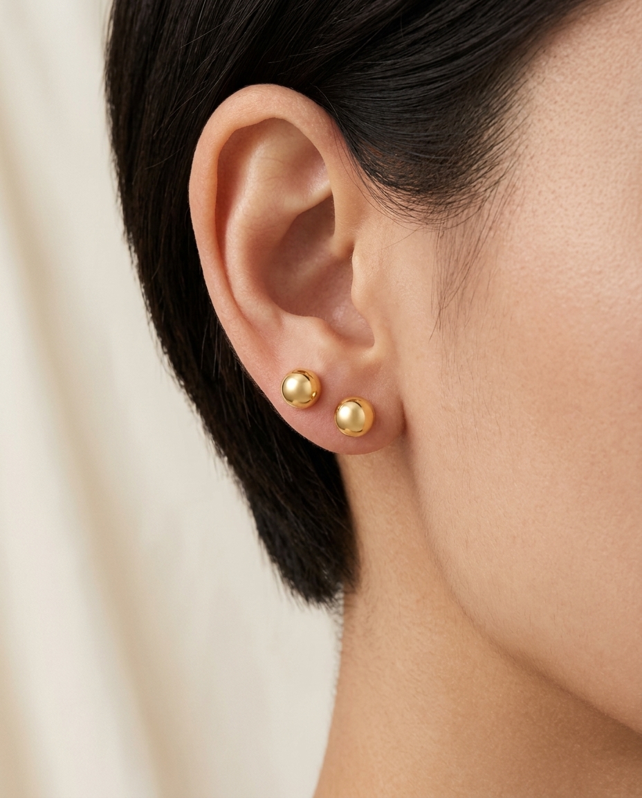 Ball Earring in Yellow Gold on model