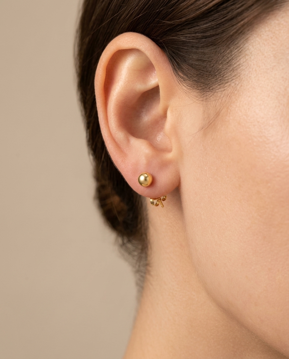Ball Earring in Yellow Gold on model