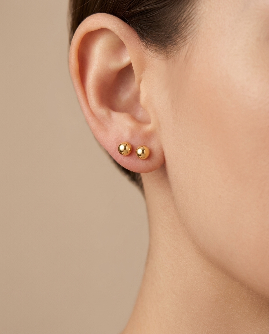 Ball Earring in Yellow Gold on model