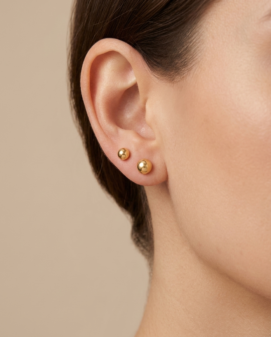 Ball Earring in Yellow Gold on model