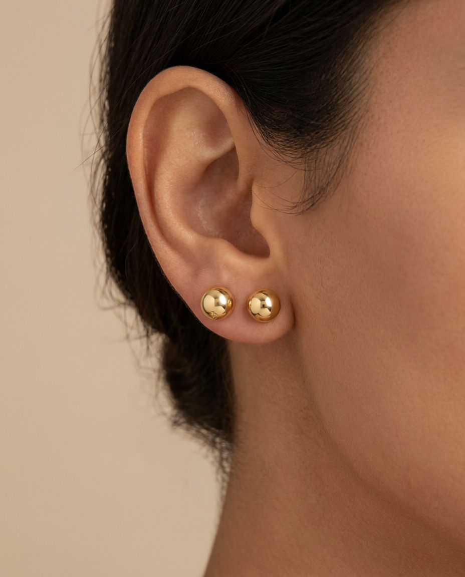 Ball Earring in Yellow Gold on model