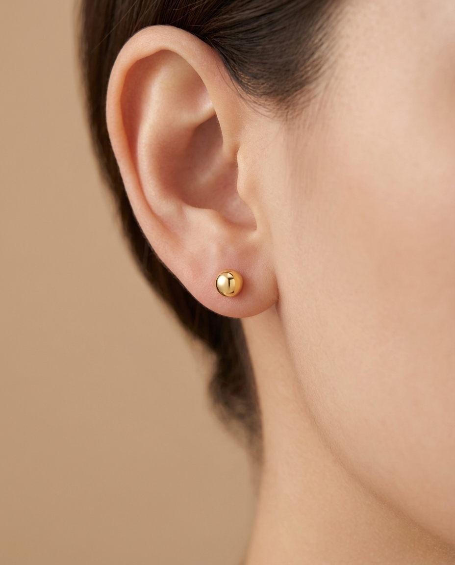 Ball Earring in Yellow Gold on model
