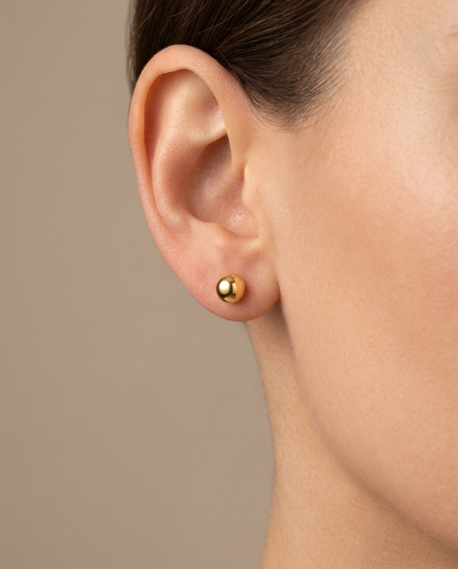 Ball Earring in Yellow Gold on model