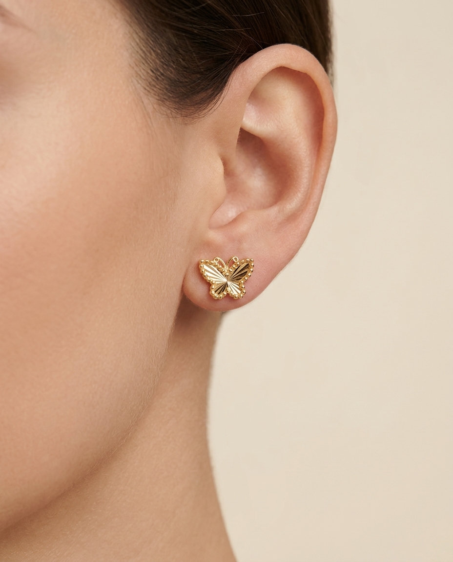 Butterfly Shape Earrings in Yellow Gold on model