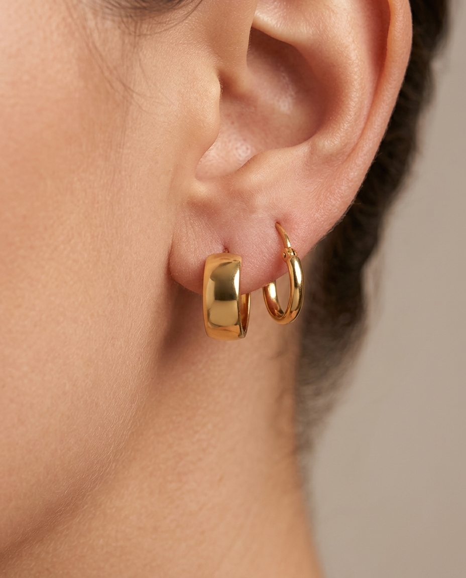 Plain Huggies Earring in Yellow Gold on model