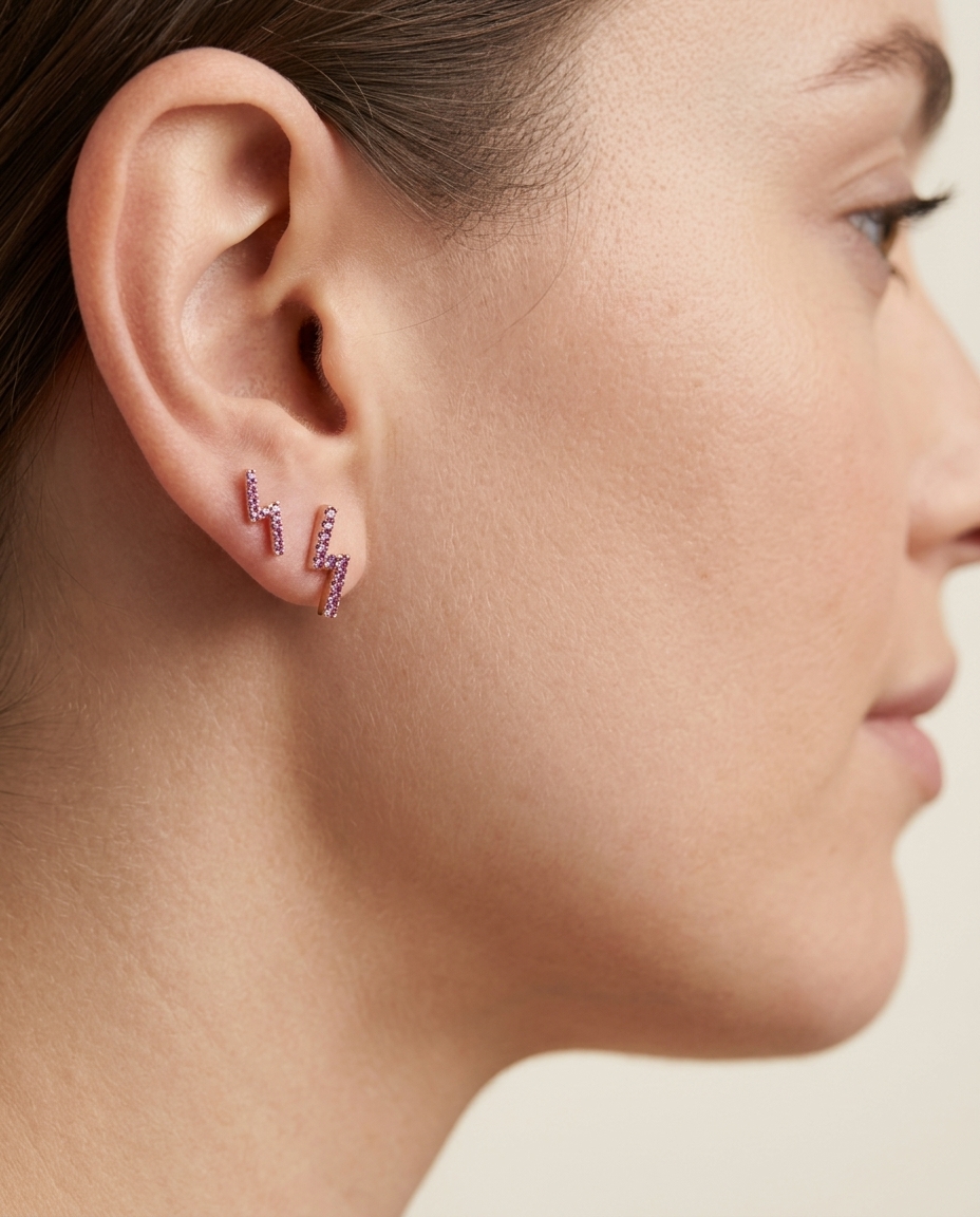 Pink Sapphire Lighting Bolt Earring . in Rose Gold on model